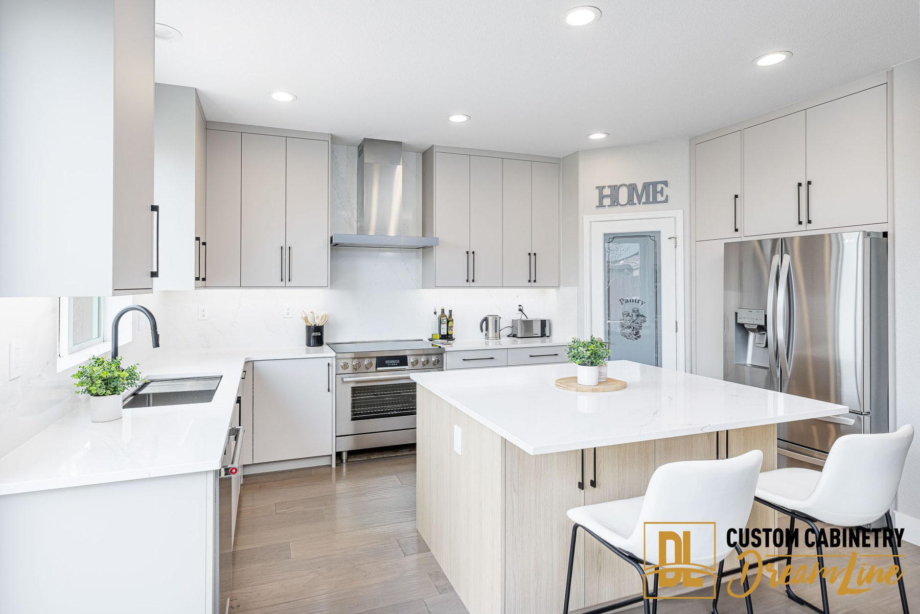 Custom kitchen cabinets in light gray and oak